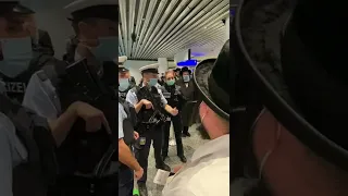 German Policeman reacts to being called a Nazi at the gate of Lufthansa 1334