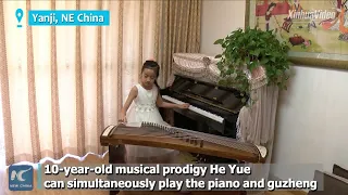 10-year-old Chinese prodigy simultaneously plays piano and guzheng