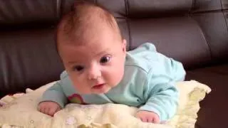 3 months old baby tryies crawling