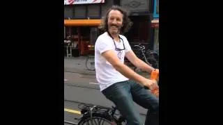 On a bike with DJ Harvey