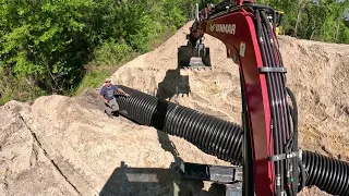 Installing The Overflow To Finish The 15 Acre Lake