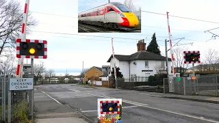 Fast trains at Rossington Level Crossing, South Yorkshire