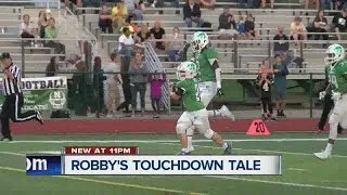 High school football manager with Down syndrome scores TD, mother with terminal illness watches