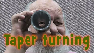Turning a deep tapered hole using step boring method