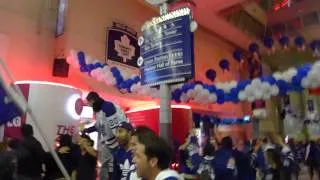 Toronto Maple Leafs fans celebrate after the Leafs win Game 5