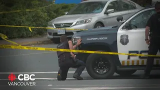 Shootout at a bank near Victoria leaves two suspects dead, six police officers injured