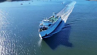 The ferry at Jeanne Garant Harborfront park at Port Jefferson Long Island flying the dji Air 3