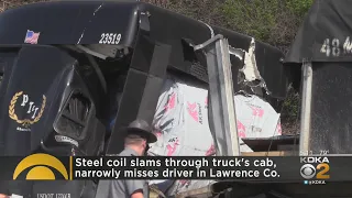 Steel Coil Crashes Through Cab Of Truck