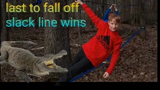 Last to fall off slackline wins