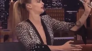 Cara Delevingne 2019 playing guitar behind her back Jimmy Fallon New video