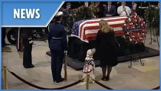 President George H.W. Bush's service dog Sully visits his casket