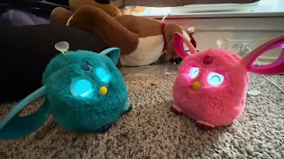 Two furby connects talking to each other.