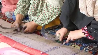 Afghan carpet factory provides hope and jobs for women banned from education and employment