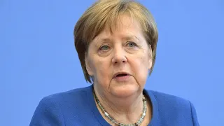Merkel: "Wir dürfen das Gesundheitssystem nicht überlasten" | AFP