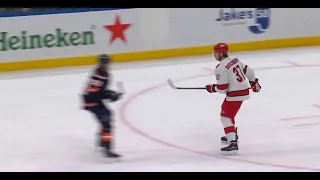 Alex Romanov jumps at Andrei Svechnikov, both got penalties (21 jan 2023)