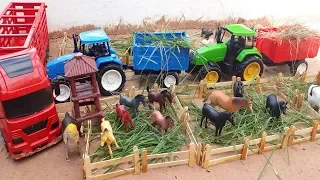 playing farm building fence for animals tractors taking the animals' food