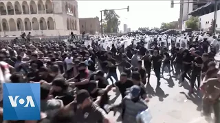 Protesters Clash With Police in Baghdad Streets