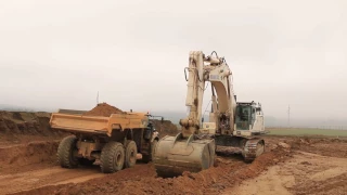 Komatsu PC800 LC loading trucks and ADT´s