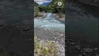 Black and white Aragvi rivers meeting point  @ Georgia   that do not mix up