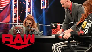 Lita and Becky Lynch sign the contract for Raw Women’s Championship Match: Raw, Feb. 14, 2022