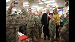 Making first war-zone trip, Trump surprises U.S. troops in Iraq