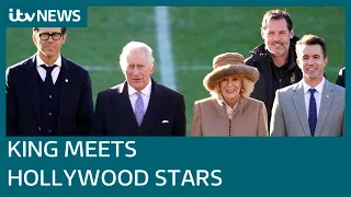 Charles visits Wrexham to meet club's Hollywood owners Ryan Reynolds and Rob McElhenney | ITV News