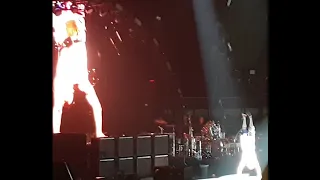 Flea does hand-stand walk onto stage "Just Like U Said It Would B"