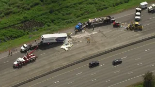 Northbound I-5 in Fife still closed after deadly crash. Cleanup underway