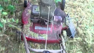 Modified lawnmower to cut high tall grass