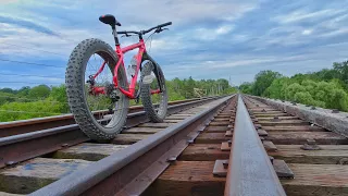 INSANE RIDING MY FAT BIKE ACROSS A TRAIN BRIDGE