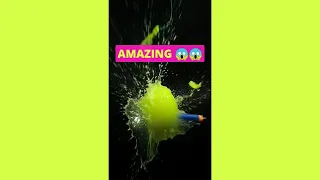 Amazing satisfying water balloon pop 😱😱 #satisfying #slowmotion #asmr #reverse