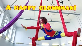 A happy clownman! Aerial gymnast on silks. Kira Aralova (9 years old).