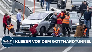 GOTTHARDTUNNEL: Klimaaktivisten kleben sich im Osterstau auf Autobahn fest