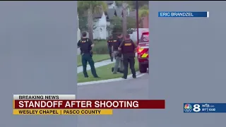 Pasco County Sheriff's Office: A man is barricaded in a Wesley Chapel home after he shot a woman