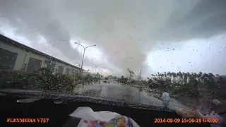 Car gets picked up by tornado with people inside!