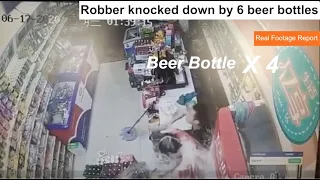 Robber knocked down by 6 beer bottles - when robber mess with wrong guy