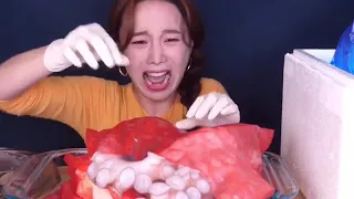 Korean Lady Screaming at Octopus Then Eating it.
