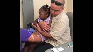 My 2 year old getting her shots like a champ