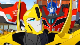 ¡Llegan Optimus Prime y Bumblebee! | Transformers: Robots in Disguise | COMPILACIÓN | Animación