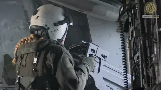 U.S. Marines shoot machine guns on a CH-53E Super Stallion during Distributed Aviation Operations