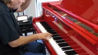 Peter plays improvisation and "House of the rising sun" on Elton John,s red piano