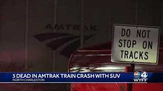 3 dead in SUV crash with Amtrak train, officials say