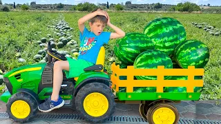 Damian and Darius pick up watermelons riding tractors in the field - Fun Kid's adventure