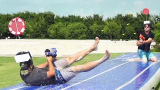 Nerf Slip and Slide Battle | Dude Perfect