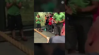 3 Body Builders Play Tug of War Against A Lion