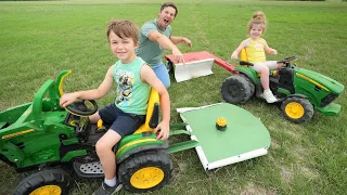 Using kids tractors to mow hay on the farm | Tractors for kids