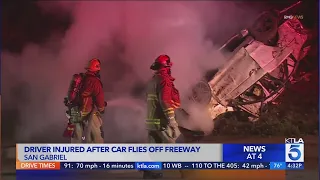 Driver injured after car flies off freeway