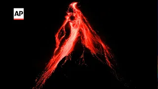 Philippine volcano spews lava