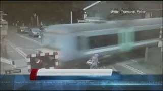 Camera catches woman nearly being hit by train