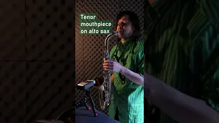 Playing tenor mouthpiece on alto saxophone.